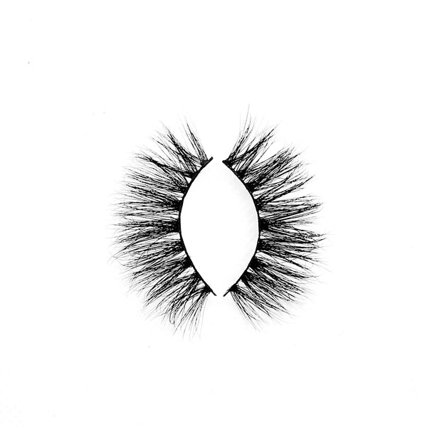 Halo-High Volume-You'll feel unbelievably confident in our mink lash style "Halo." These long, wispy lashes are perfect for a glamorous look. The longest hairs are located in the middle, creating a gorgeous eye opening effect that’ll make the whole world stop and stare! They’re super versatile and pair perfectly with a seductive, smokey eye look. Also available in our "Dramatic (3-Pack)" Description Handmade, Cruelty-Free, Wear up to 30x Material: 100% Mink Band: Thin, Black Cotton Band Volume: 