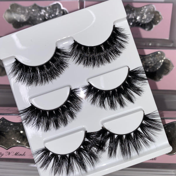 Boss Up (3-Pack)-High Volume-This set includes (3) High Volume Mink lashes: Hustla Finesser Indespoiled Description Handmade, Cruelty-Free, Wear up to 30x Material: 100% Mink Band: Black Cotton Band Volume: High Volume Style: Dramatic, Long, Wispy, Cat-eye, Open-eye To Use: Measure and size your lashes by placing the false lash against your lash line where your natural lashes start. Using Mini Scissors, cut off the excess lash band length from the outer corners to ensure they fit properly. Apply