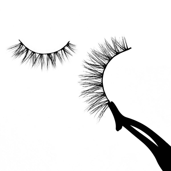 Butterfly-Medium Volume-“Butterfly” is a natural yet unique 3D lash that’s perfect for everyday looks. Our light volume “Butterfly” lashes add the finishing touch to any everyday, on the go, natural look. The unique design and cat-eye effect from these lashes will have you hooked! Description Handmade, Cruelty-Free, Wear up to 30x Material: 100% Mink Band: Black Cotton Band Volume: Medium Style: Wispy, Cat-eye, Flirty, Natural To Use: Measure and size your lashes by placing the false lash agains