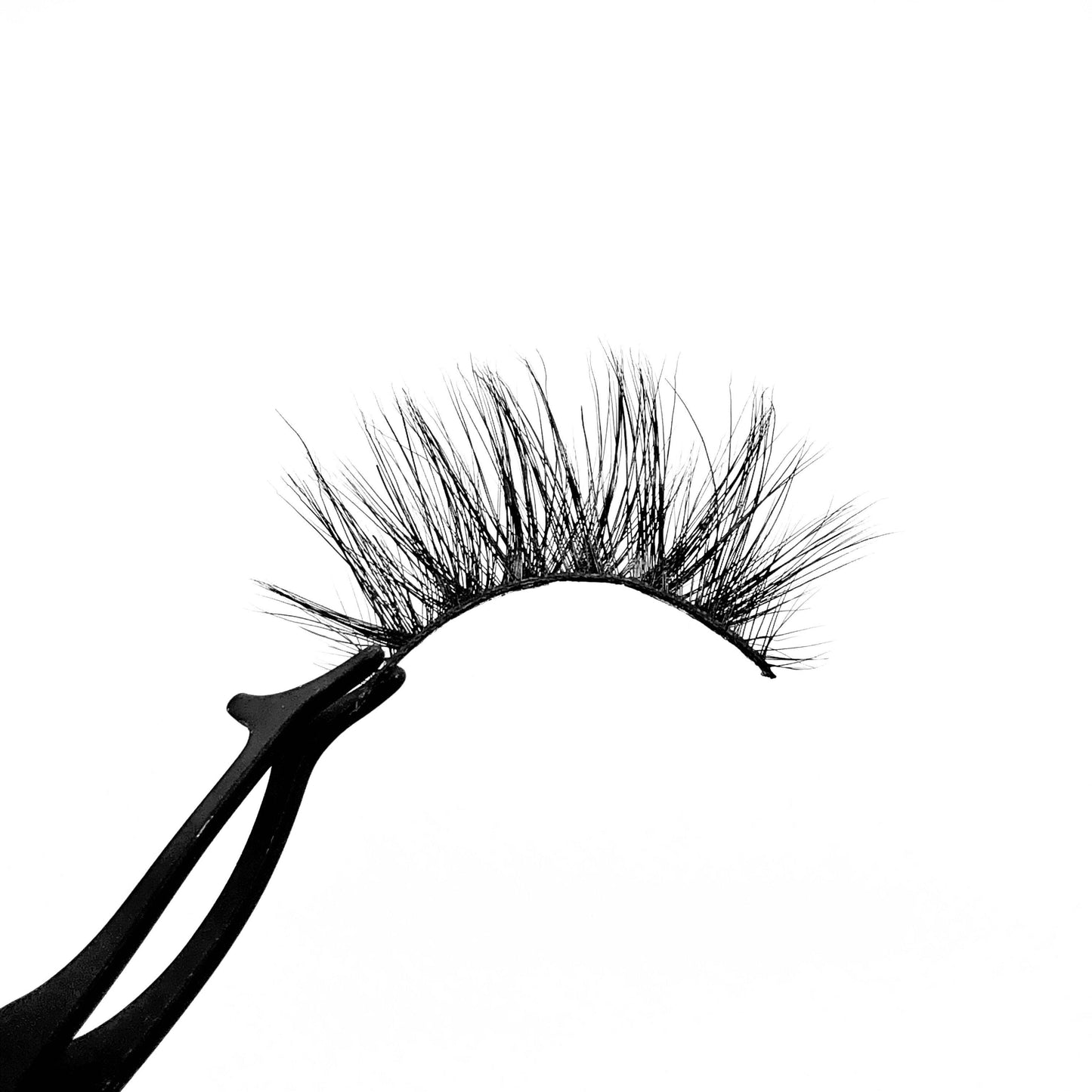 Goddess-High Volume-Our “Goddess” mink lashes feature an elongated crisscross pattern that gives you a long, wispy look. These glamorous lashes have longer hairs in center and shorter hairs on the corners for an open-eye effect. Description Handmade, Cruelty-Free, Wear up to 30x Material: 100% Mink Band: Black Cotton Band Volume: High Style: Wispy, Dramatic, Open-eye, Flirty To Use: Measure and size your lashes by placing the false lash against your lash line where your natural lashes start. Usi